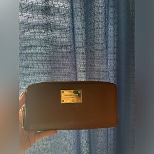 Brown Michael kors wallet.